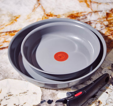 Ensemble de 2 casseroles en céramique 24/28 cm + poignée amovible